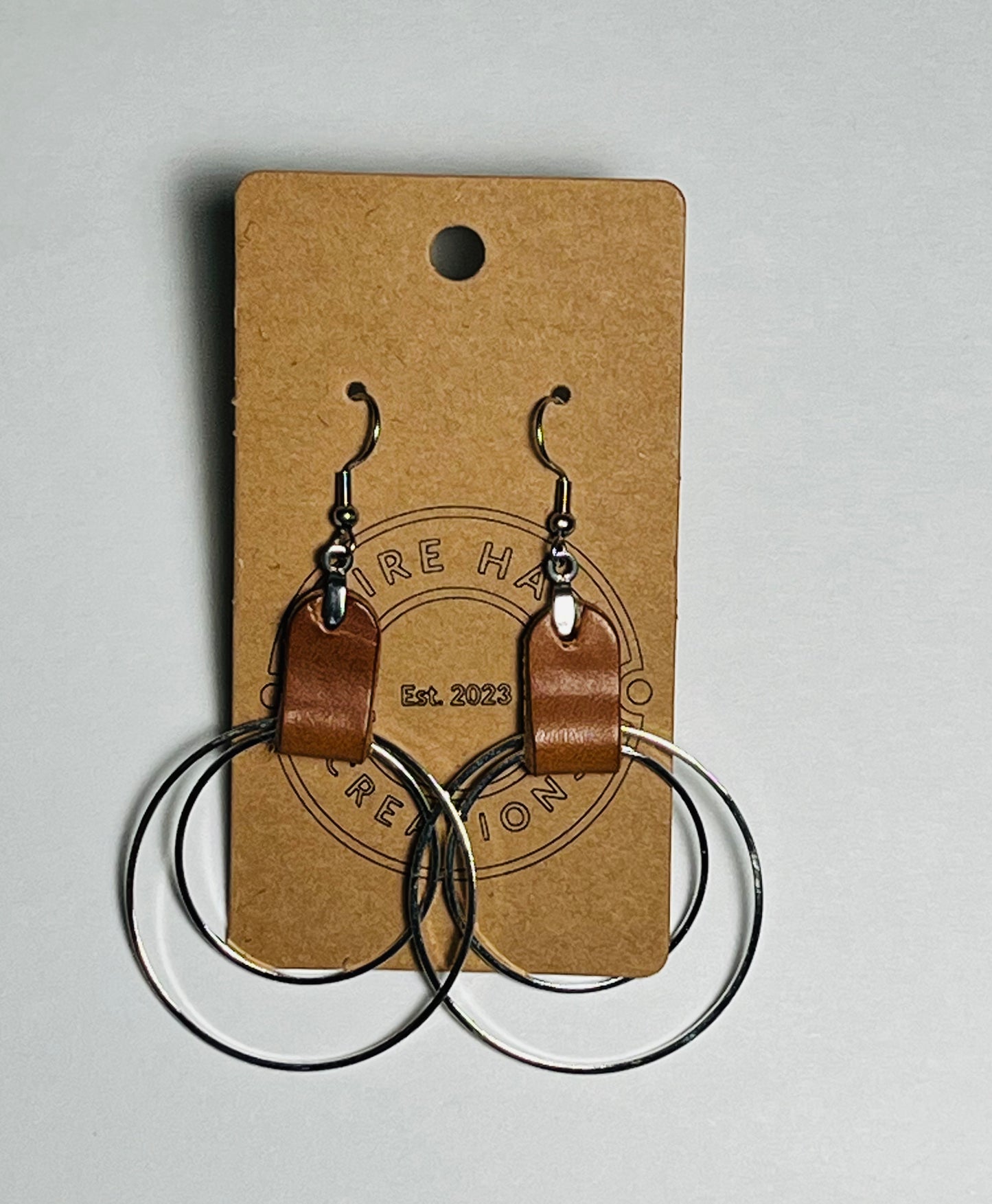 Leather and hoop earrings