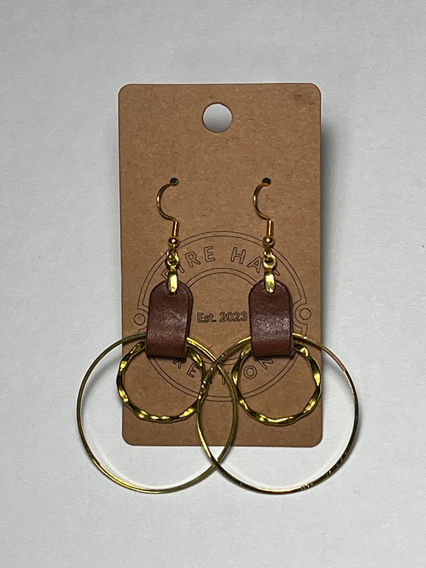 Leather and hoop earrings